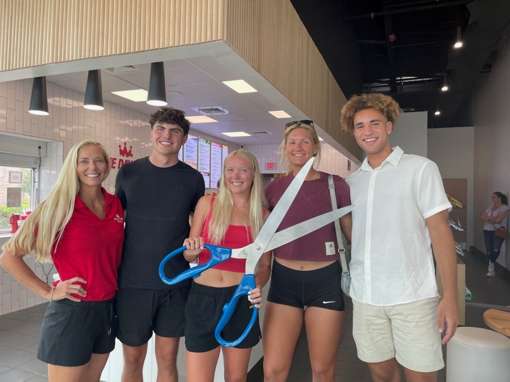 Grand opening ribbon cutting for the Smoothie King store that Pater (left) opened in April 2025. Credit: Lorraine Pater / Smoothie King