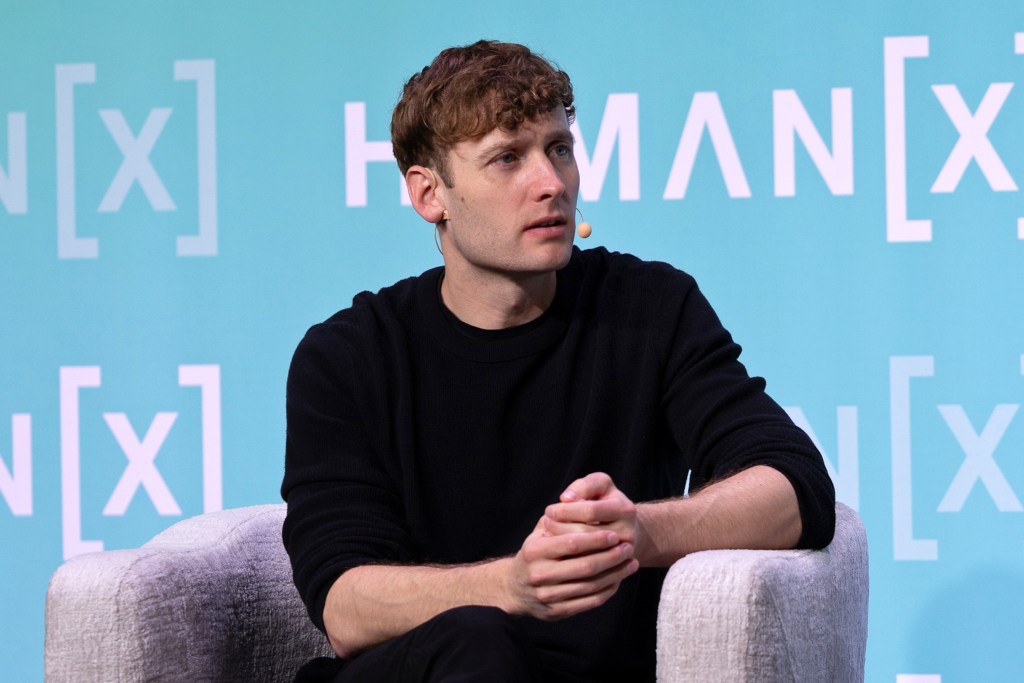 SAN FRANCISCO, CALIFORNIA - APRIL 07: Winston Weinberg speaks onstage during the "Driving Long-Term Impact in an AI Economy" at the HumanX Conference San Franciso 2026 at Moscone Center South on April 07, 2026 in San Francisco, California. (Photo by Big Event Media/Getty Images for HumanX Conference)