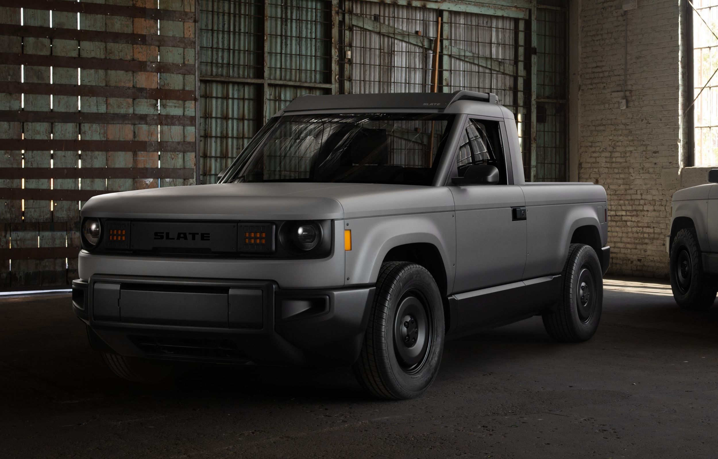 New Cars Cost Too Much. Jeff Bezos Is Backing a $24,950 EV Truck With Hand-Crank Windows to Fix That.