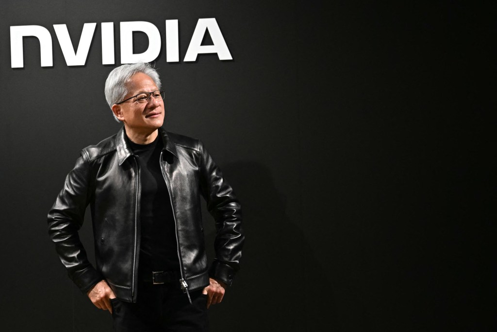 Nvidia CEO Jensen Huang attends the Q&A session with the media during Nvidia/Japan AI Ecosystem Reception in Tokyo on July 16, 2026. AI-powered robots for use in shipbuilding, the Japanese firm said on July 16 during a visit to Tokyo by the US chip giant's CEO Jensen Huang. (Photo by Philip FONG / AFP)